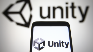 In This Photo Illustration Unity Software Inc. (U Stock) Logo Is Seen On A Mobile Phone And A Computer Screen.