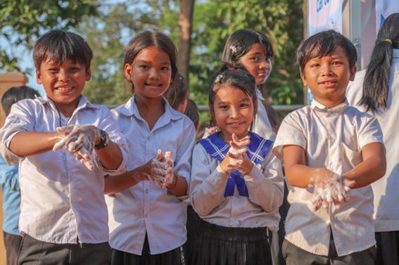 School Children Washing Hands - School children washing hands at a Planet Water Foundation AquaTower in Cambodia. The system provides handwashing facilities and safe drinking water for up to 1,800 people.