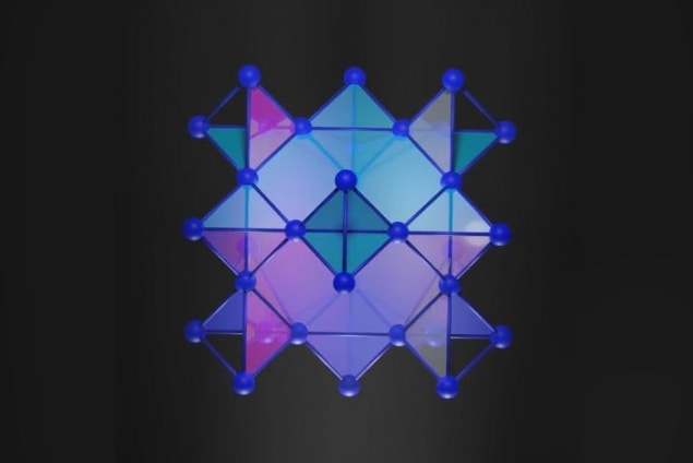 Artist's image of the crystal used in the study. Blue dots arranged in concentric squares rotated by 45 degrees and triangles represent the positions of atoms