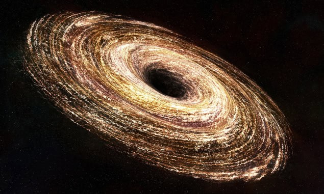 Representación artística de un agujero negro rodeado por una espiral de materia brillante.